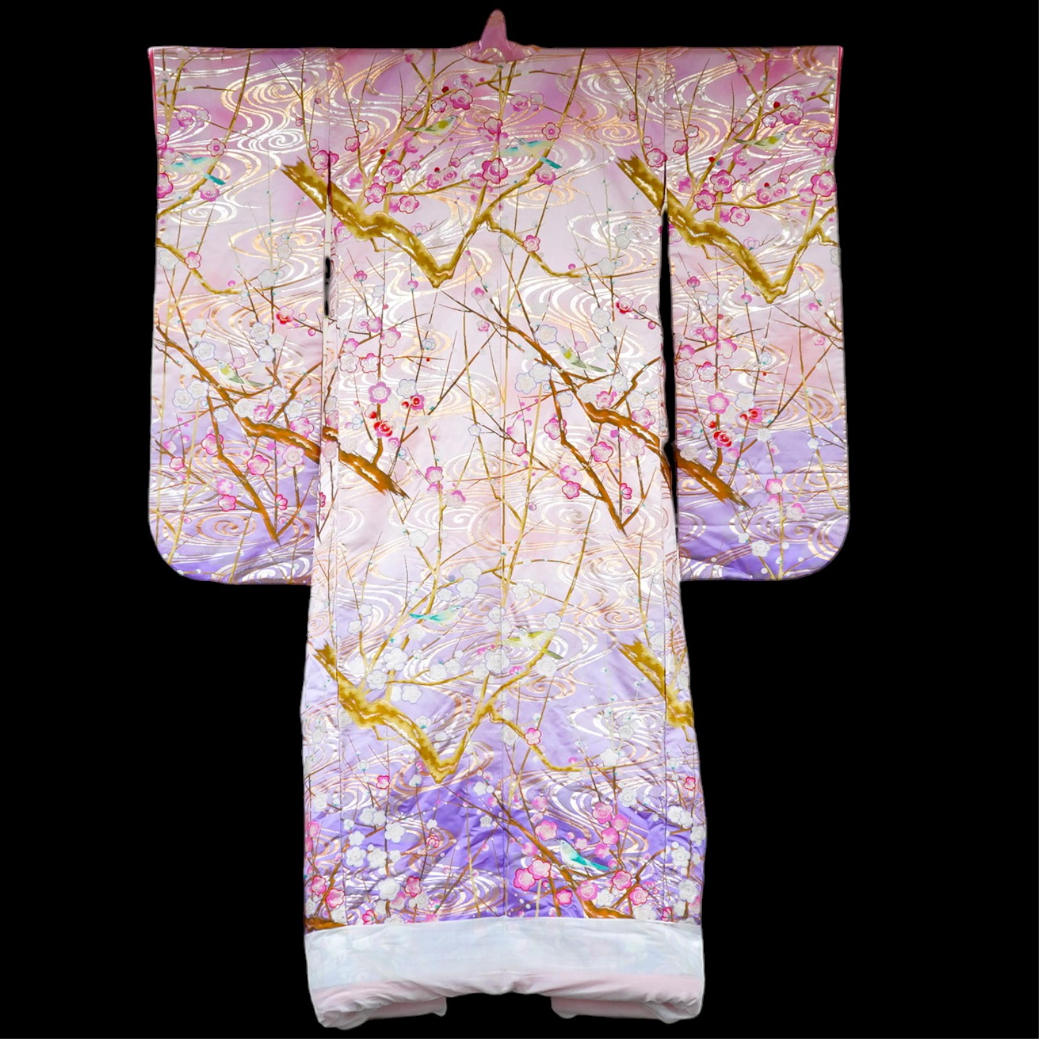 A stunning vintage ‘Four Seasons’ silk brocade wedding kimono, bought in 2004 from Masae Shibamura, in Tokyo. The kimono made from soft silk brocade, in pastel shades of graduating pink, lilac and purple, designed with b